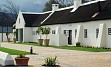 V dolini Franschhoek se nahaja eden najstarejših vinogradov na rtu. Zgodovinska, z veliko ljubeznijo do podrobnosti urejena posest povezuje južnoafriško kmečko tradicijo z modernim stilom.