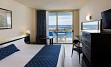 Hotel se nahaja na odlični lokaciji v središču Playe de Las Americas. Opremljen je v barvah mediterana in se ponaša z velikim bazenom.